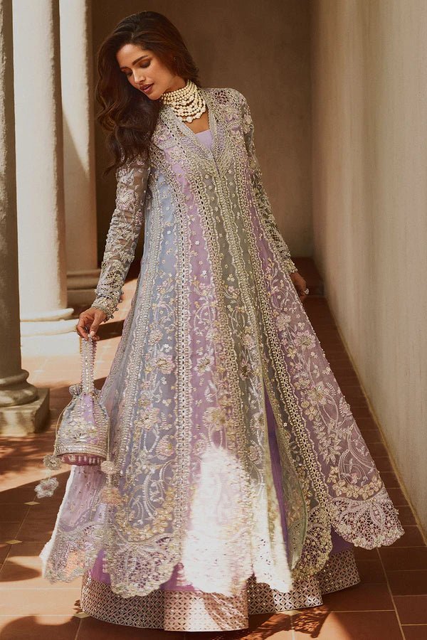 Model wearing pastel lilac ORCHID dress from Soraya, adorned with intricate embroidery and embellishments, perfect for Pakistani wedding clothes in the UK.