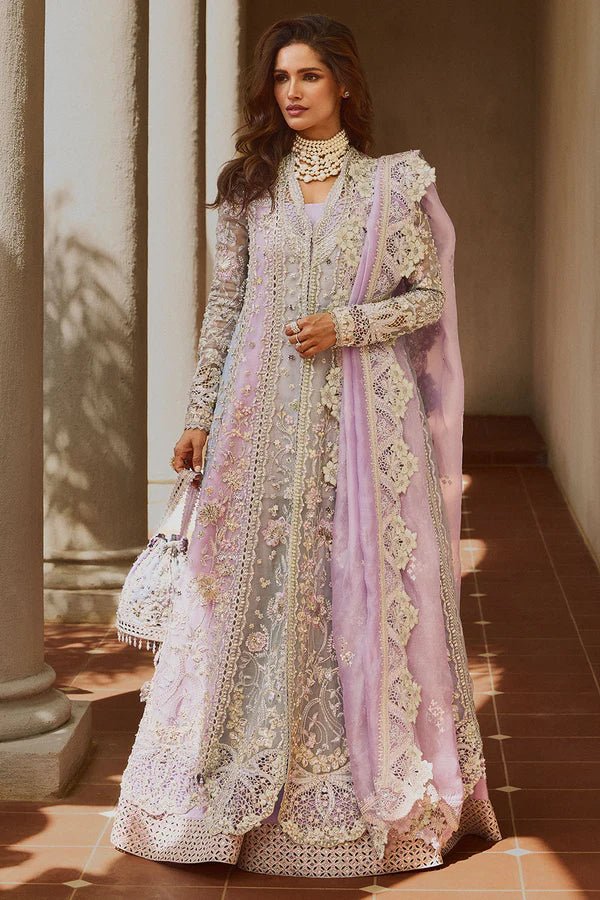 Model wearing pastel lilac ORCHID dress from Soraya, adorned with intricate embroidery and embellishments, perfect for Pakistani wedding clothes in the UK.