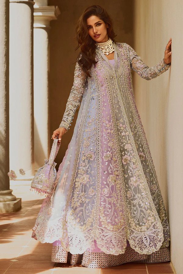 Model wearing pastel lilac ORCHID dress from Soraya, adorned with intricate embroidery and embellishments, perfect for Pakistani wedding clothes in the UK.