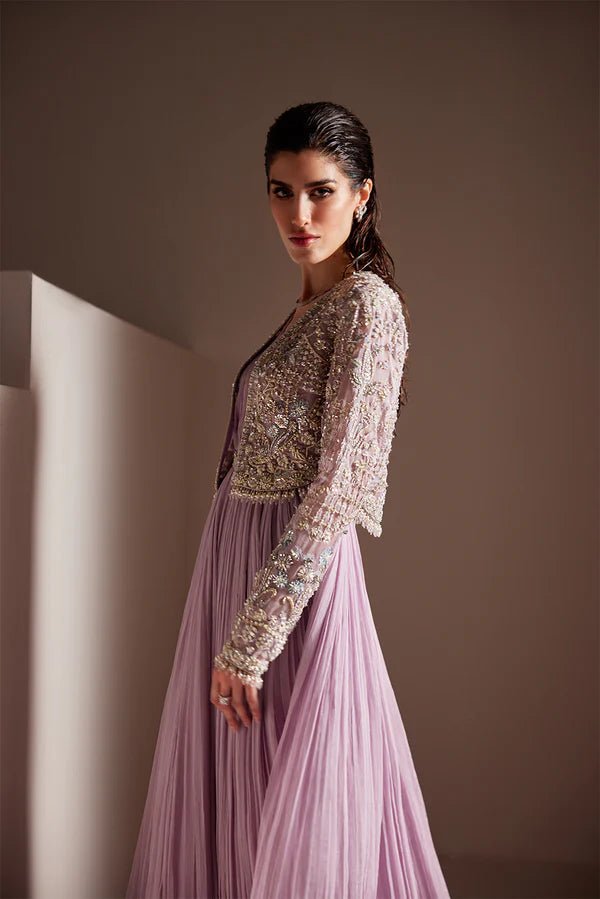 Model wearing Soraya Charisma dress in lilac from the Oriana Luxury Formals collection, perfect for weddings, available for Pakistani clothes online in the UK.