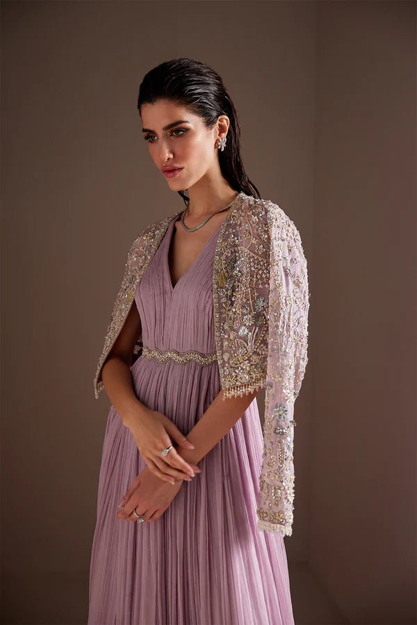 Model wearing Soraya Charisma dress in lilac from the Oriana Luxury Formals collection, perfect for weddings, available for Pakistani clothes online in the UK.