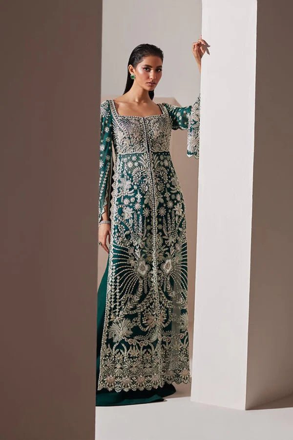 Model wearing Soraya Luxe dress in deep green from the Oriana Luxury Formals collection, ideal for weddings, available for Pakistani clothes online in the UK.