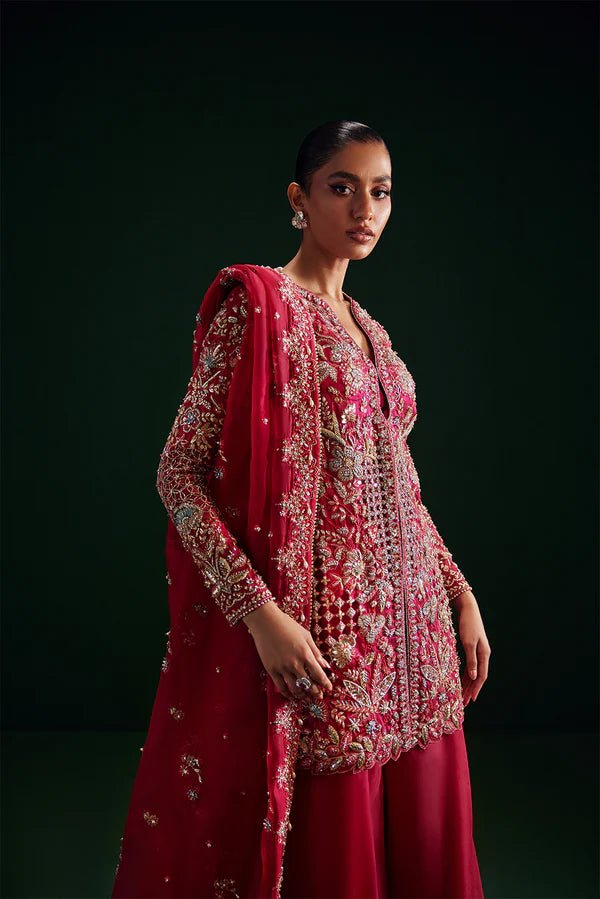 Model wearing Soraya Oriana Luxury Formals Regal dress in red, featuring exquisite embroidery, perfect for Pakistani clothes online in the UK, ideal for weddings.