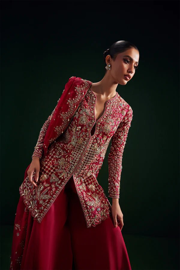 Model wearing Soraya Oriana Luxury Formals Regal dress in red, featuring exquisite embroidery, perfect for Pakistani clothes online in the UK, ideal for weddings.