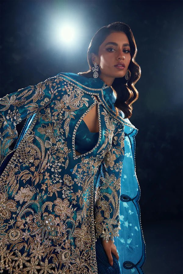 Model wearing Soraya Oriana Luxury Formals Serenity dress in teal, featuring intricate embroidery, ideal for Pakistani wedding clothes online in the UK.