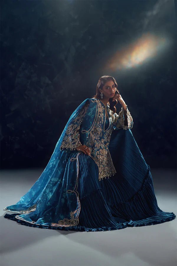 Model wearing Soraya Oriana Luxury Formals Serenity dress in teal, featuring intricate embroidery, ideal for Pakistani wedding clothes online in the UK.