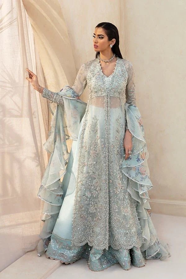 Model wearing SARANG - BRIDALS AND FORMAL '23 BLUME, an equisite mold by SORAYA UK, Pakistani Clothes UK.