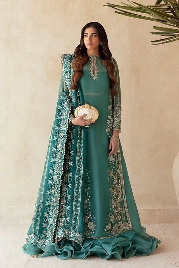 Model wearing SARANG - BRIDALS AND FORMAL '23 | PERLE, an equisite mold by SORAYA UK, Pakistani Clothes UK.