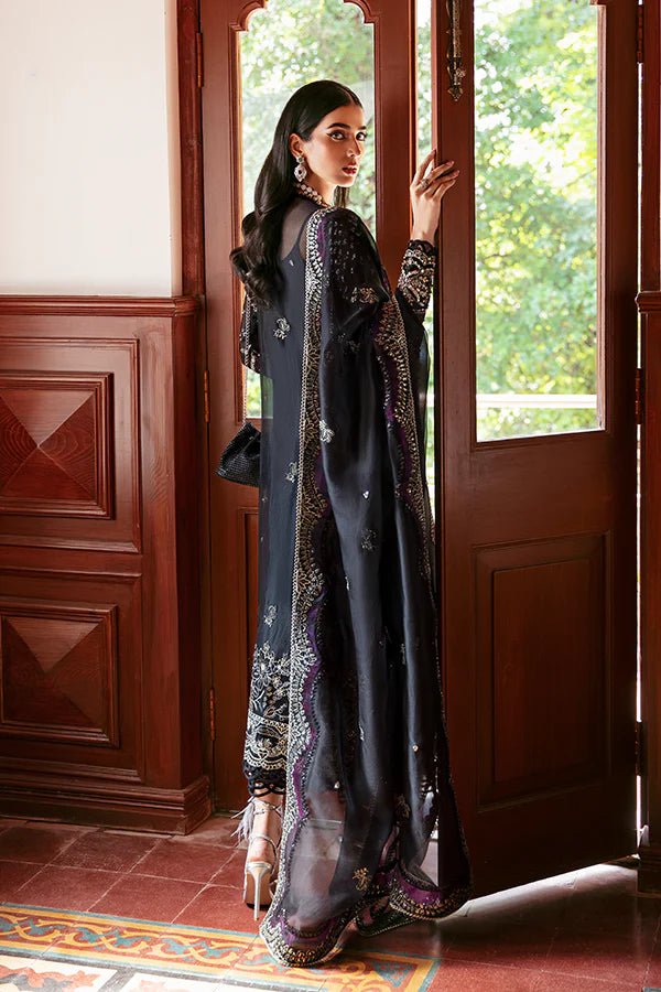 Model wearing Soraya's Lumene RTW Noir dress, a chic addition to Pakistani fashion online in UK.