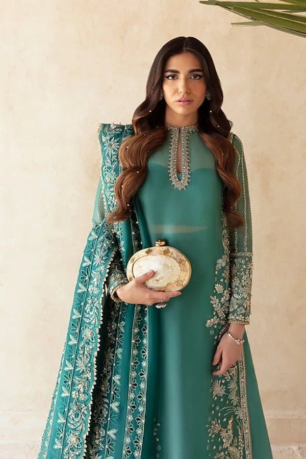 Model wearing Soraya PERLE Bridal dress, a chic choice for Pakistani wedding clothes online in the UK.