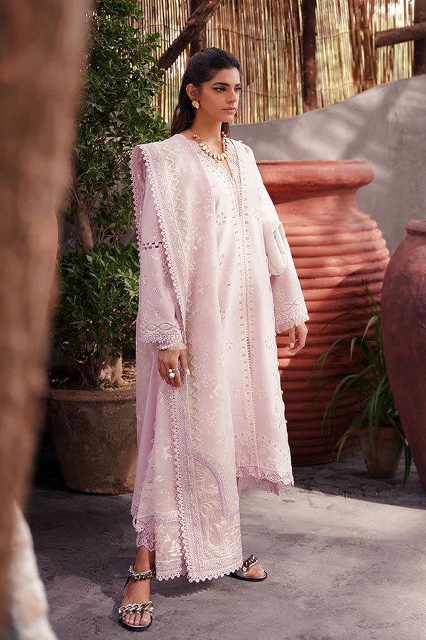 Model wearing Suffuse Fariya dress, a chic addition to Pakistani clothes online in UK. Elegance meets modern flair.