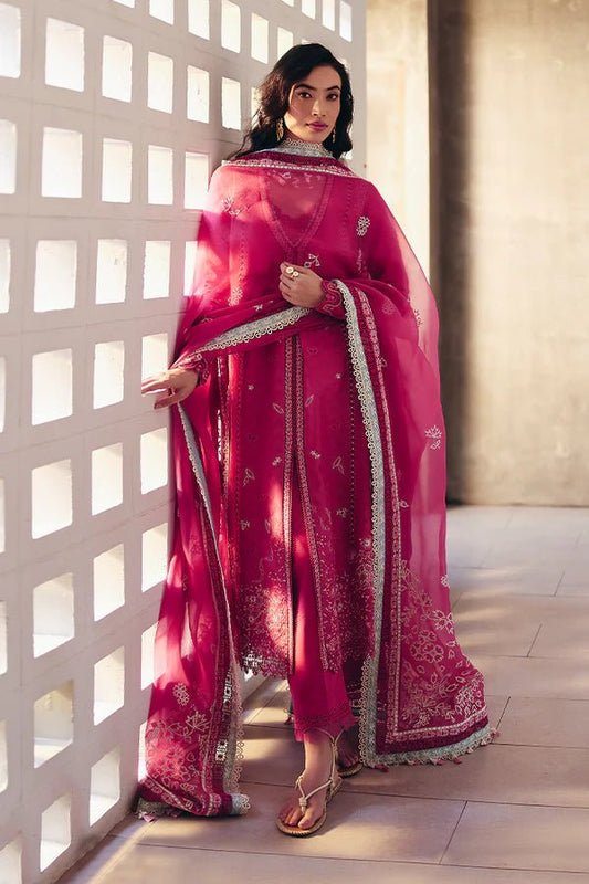 Model wearing a coral pink front open jacquard shirt with intricate lacework, embroidered straight cotton pants, and an organza dupatta featuring ice blue contrasting borders from Suffuse Casual Pret '24.