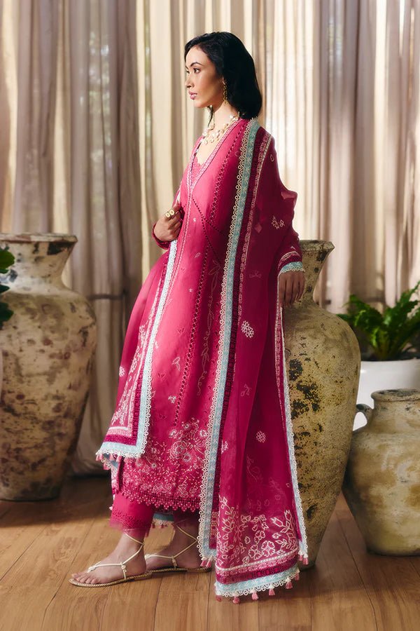 Model wearing a coral pink front open jacquard shirt with intricate lacework, embroidered straight cotton pants, and an organza dupatta featuring ice blue contrasting borders from Suffuse Casual Pret '24.