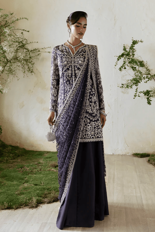 Model showcasing Suffuse Ravena dress, a timeless elegance for Pakistani wedding clothes online in UK from FREESHIA RTW '23.