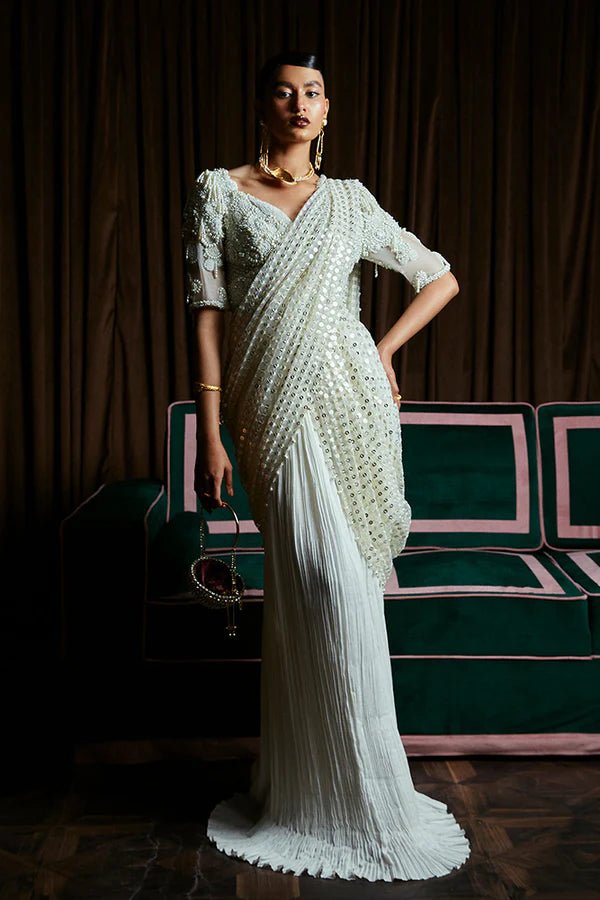 Model wearing Suffuse Luxury Pret '24 LIVIA Aqua Kaftan with Geometrical Sequin Pattern. Pakistani clothes online in UK.