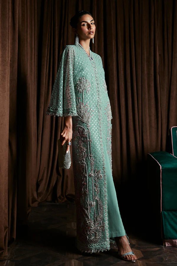 Model wearing Suffuse Livia mint embellished dress, Pakistani luxury pret '24 in UK.