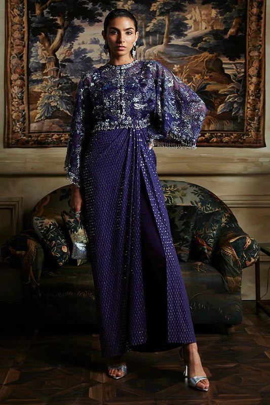 Model in Suffuse MAEVE dress, purple luxury Pakistani attire, UK.