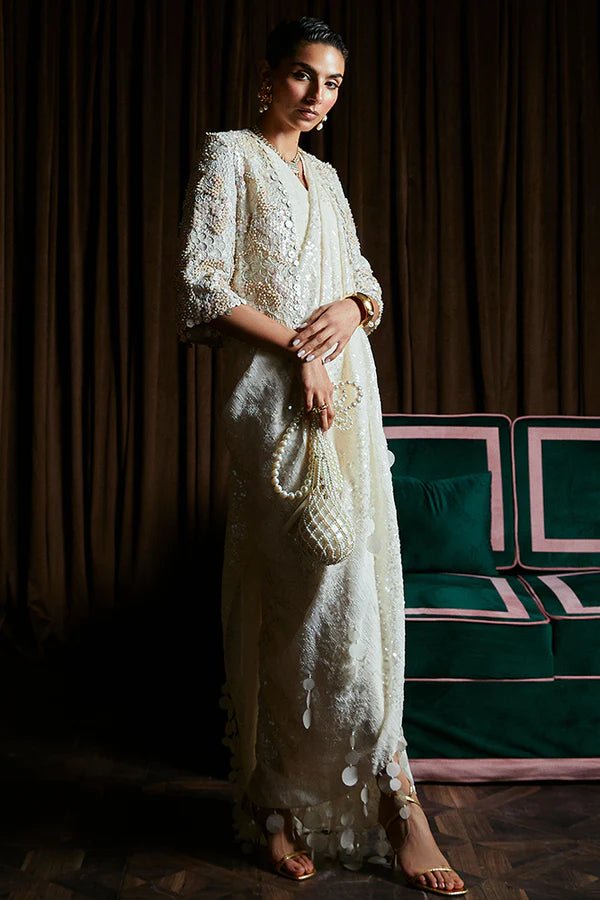 Model wearing Suffuse SERENA ivory sequined dress, Pakistani luxury pret '24 in UK.