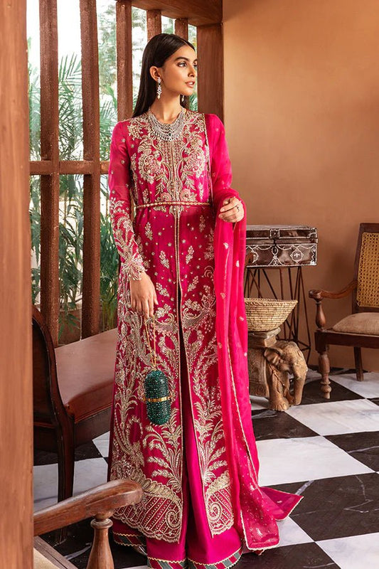 Model in Suffuse UK Fuchsia Rose luxury pret, elegant Pakistani clothes UK.