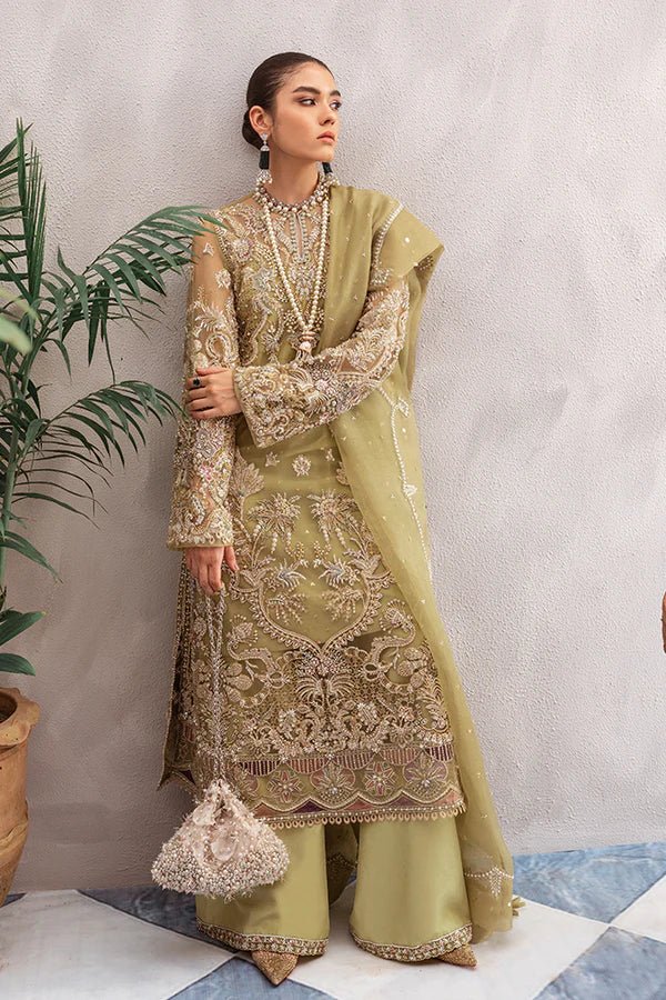 Model in Suffuse UK Sage luxury pret outfit, traditional Pakistani clothes UK.