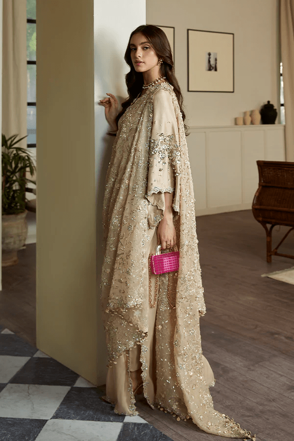 Model flaunting Suffuse Luna attire, an elegant piece from Luxury Pret '23 collection. Perfect for Pakistani fashion online in UK.