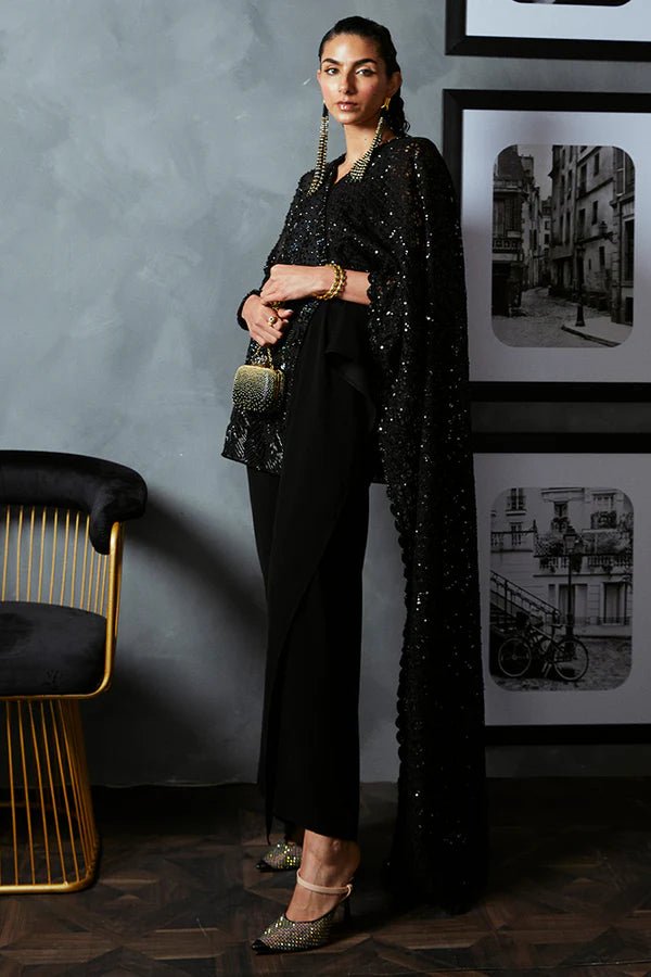 Model wearing Suffuse's BELLA dress, a standout piece from Luxury Pret '24 collection. Pakistani clothes online in UK.