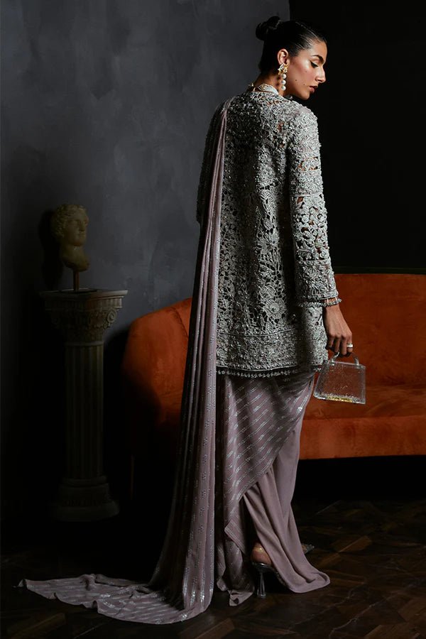 Model wearing Suffuse CAMILLA dress, a stunning addition to Luxury Pret '24. Pakistani fashion online UK.