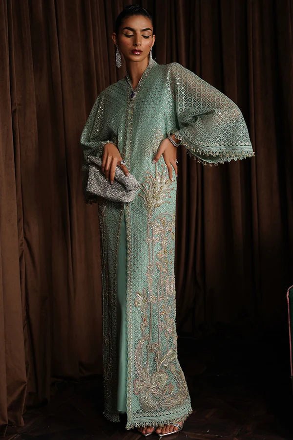 Model wearing Suffuse Luxury Pret '24 LIVIA Aqua Front Open Kaftan. Pakistani clothes online in UK.