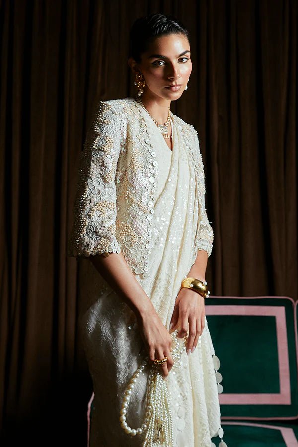 Model wearing Suffuse SERENA dress, a captivating piece from Luxury Pret '24. Pakistani couture online in UK.