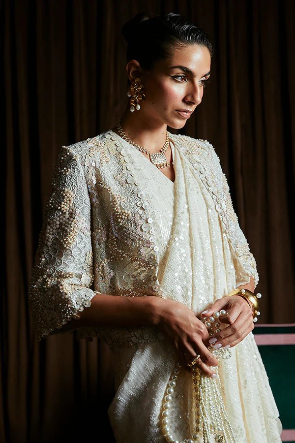 Model wearing Suffuse SERENA dress, a captivating piece from Luxury Pret '24. Pakistani couture online in UK.