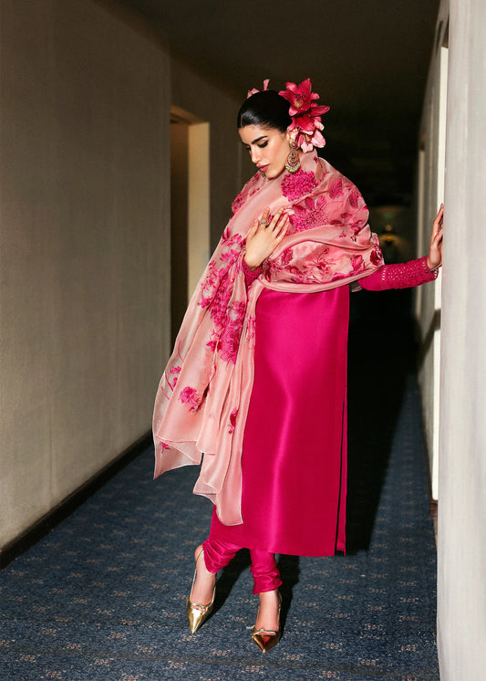 Model wearing deep pink Fusche dress by Hussain Rehar, Pakistani luxury pret available online in UK for festive occasions