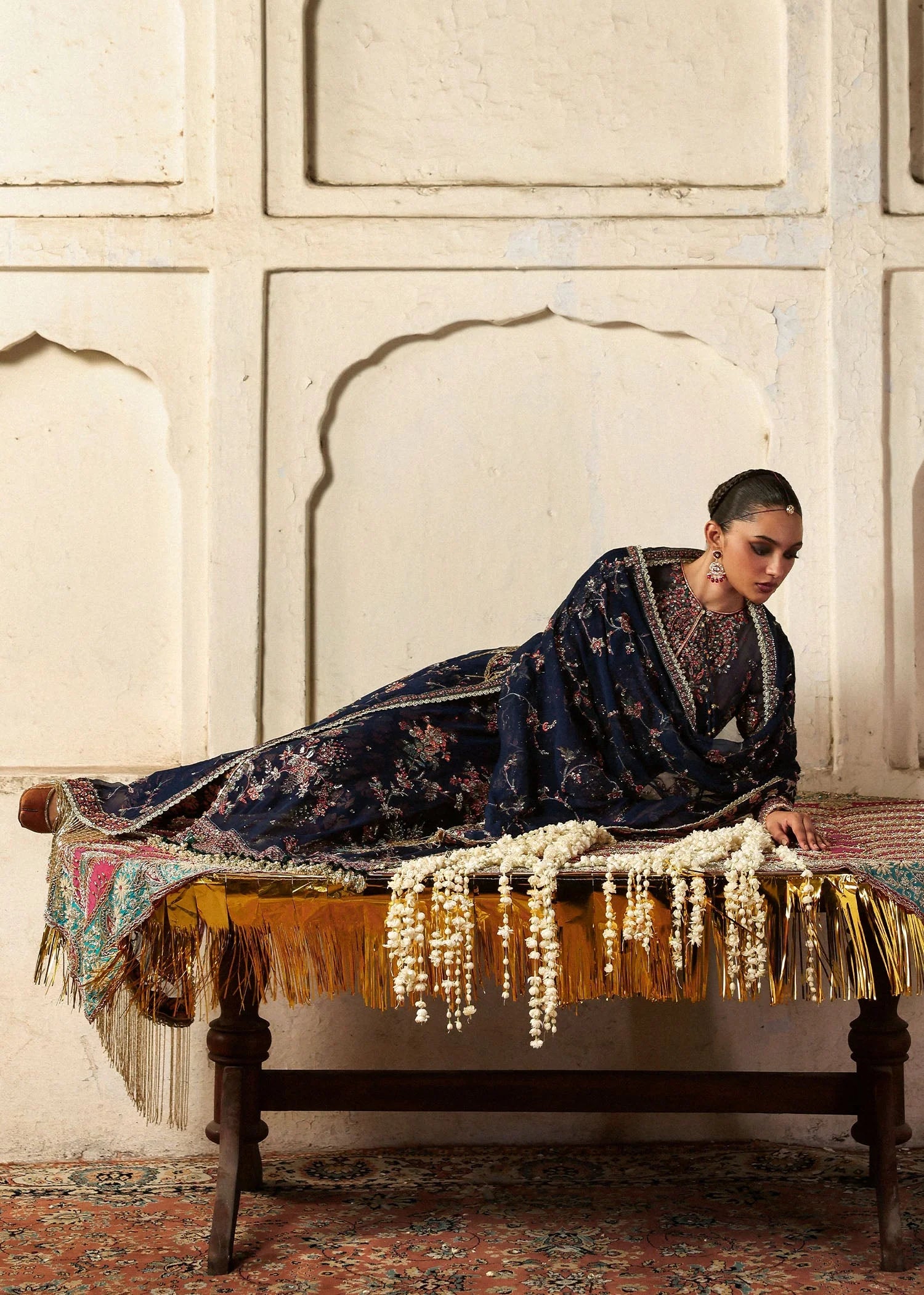 Model wearing Rabab by Hussain Rehar in navy blue floral – Pakistani luxury pret, shop Hussain Rehar clothes online in UK for festive wear.
