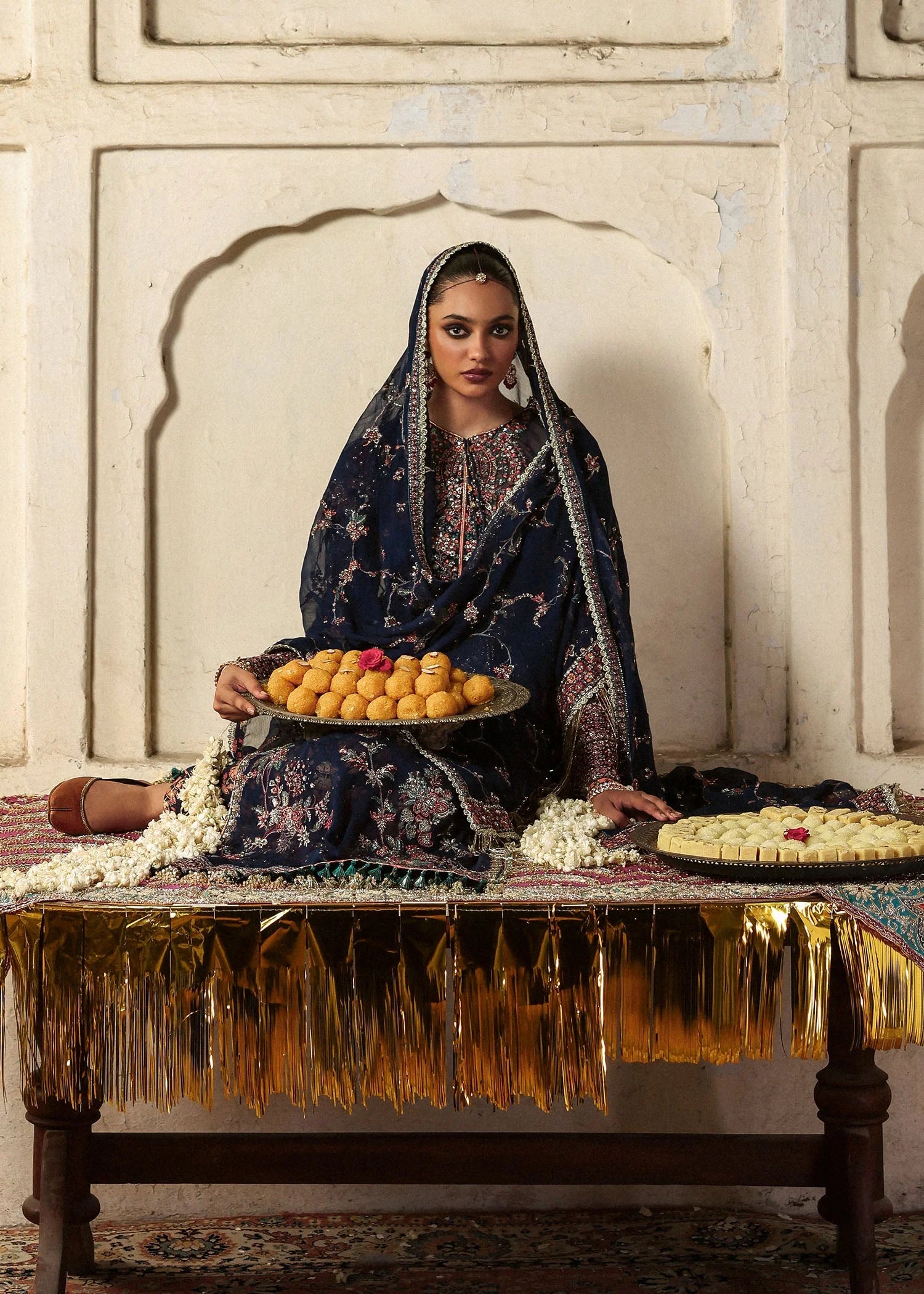 Model wearing Rabab by Hussain Rehar in navy blue floral – Pakistani luxury pret, shop Hussain Rehar clothes online in UK for festive wear.
