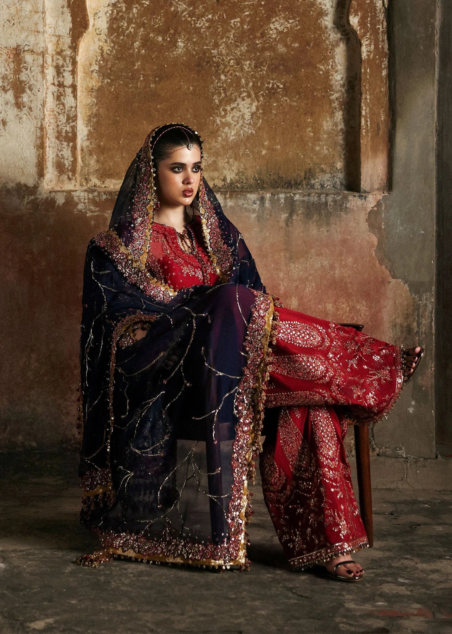 Model wearing Shahrbano by Hussain Rehar in deep red with navy dupatta – Pakistani luxury pret, shop Hussain Rehar clothes online in UK.
