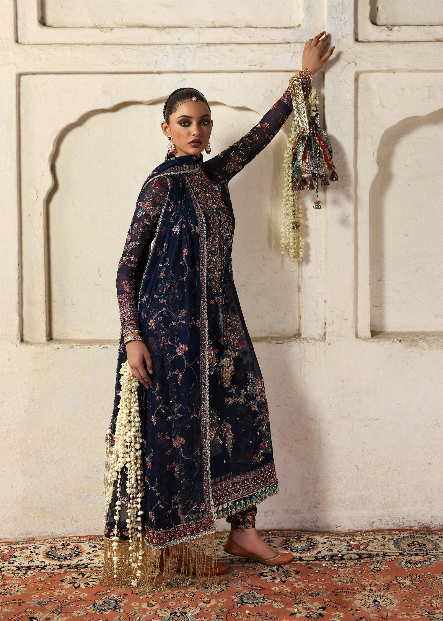 Model wearing Rabab by Hussain Rehar in navy blue floral – Pakistani luxury pret, shop Hussain Rehar clothes online in UK for festive wear.
