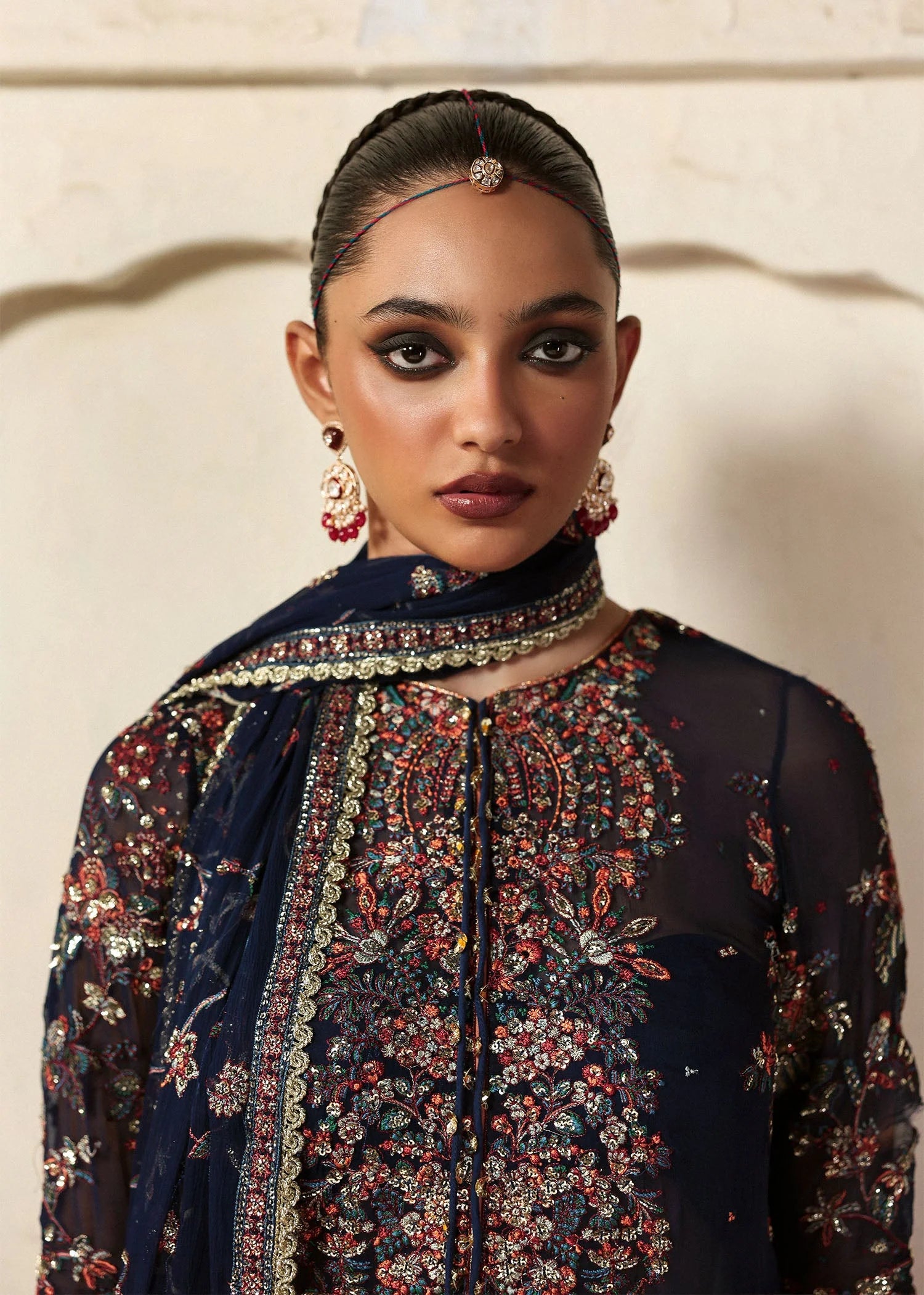 Model wearing Rabab by Hussain Rehar in navy blue floral – Pakistani luxury pret, shop Hussain Rehar clothes online in UK for festive wear.
