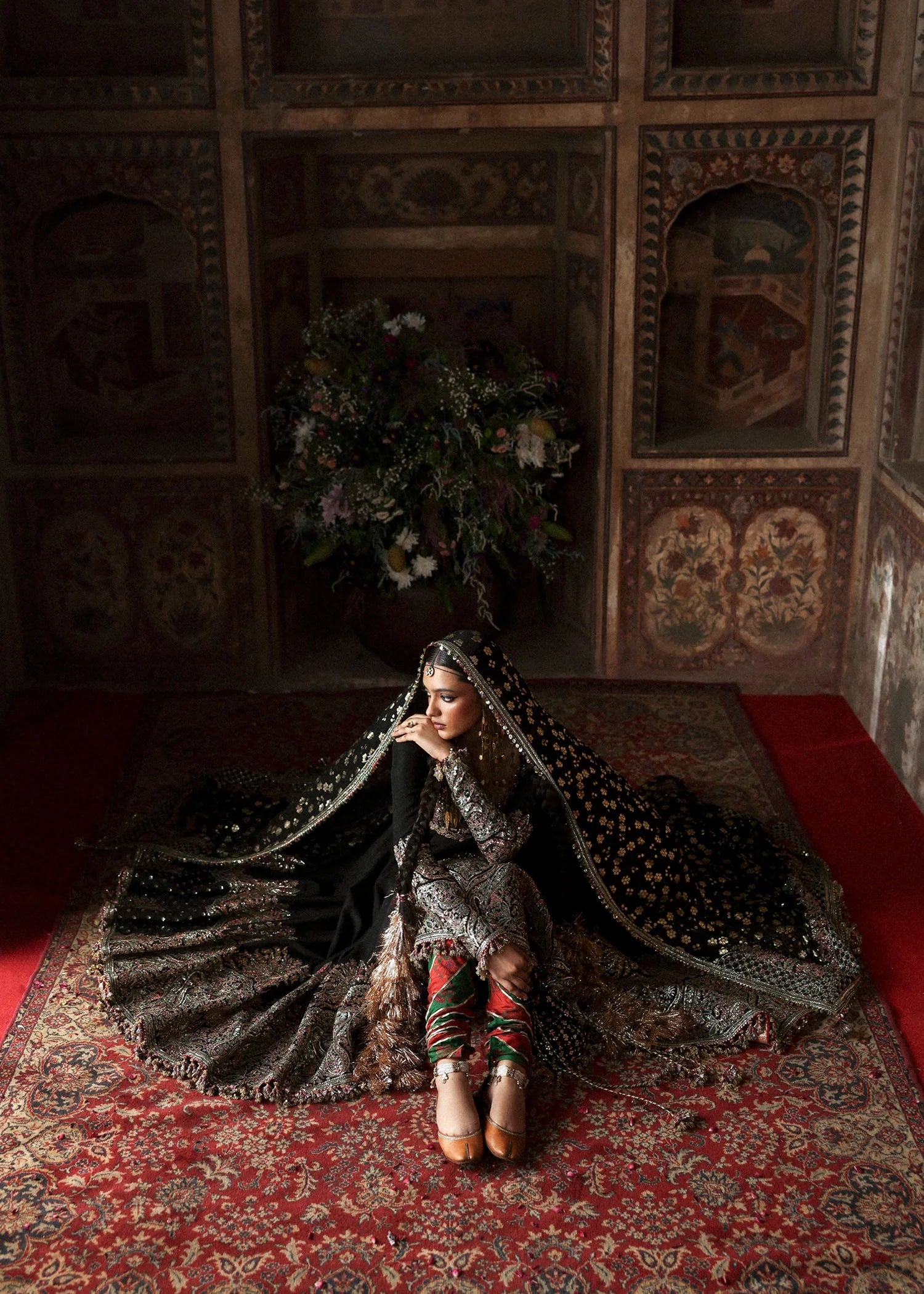 Model wearing Noor Jehan by Hussain Rehar in black with intricate embroidery – Pakistani luxury pret, shop Hussain Rehar online in UK.
