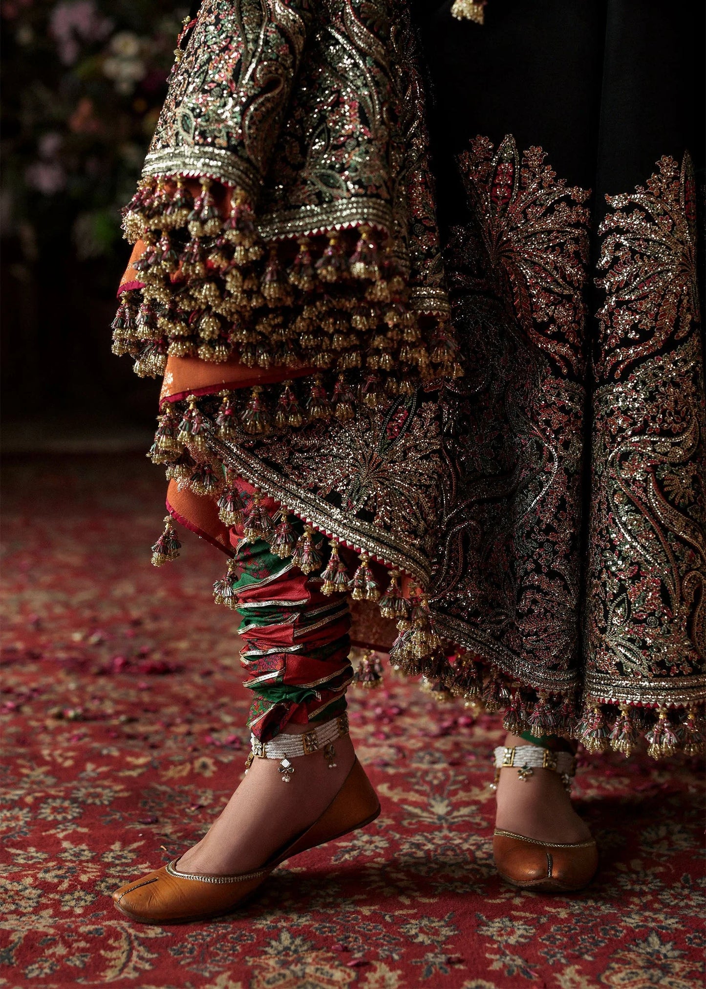 Model wearing Noor Jehan by Hussain Rehar in black with intricate embroidery – Pakistani luxury pret, shop Hussain Rehar online in UK.
