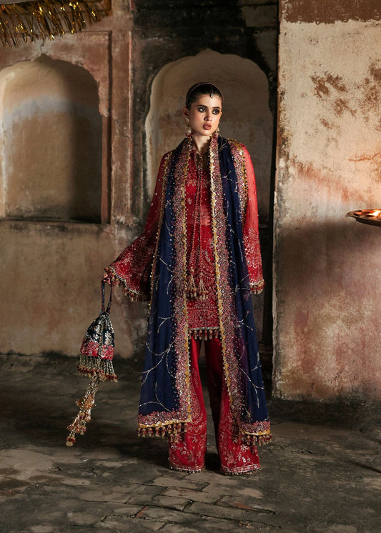 Model wearing Shahrbano by Hussain Rehar in deep red with navy dupatta – Pakistani luxury pret, shop Hussain Rehar clothes online in UK.
