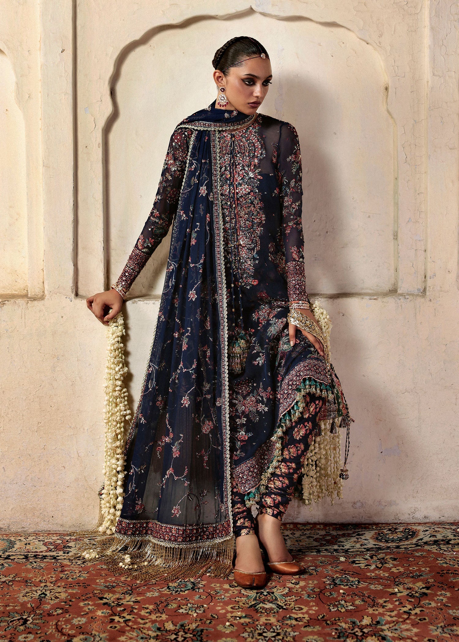 Model wearing Rabab by Hussain Rehar in navy blue floral – Pakistani luxury pret, shop Hussain Rehar clothes online in UK for festive wear.

