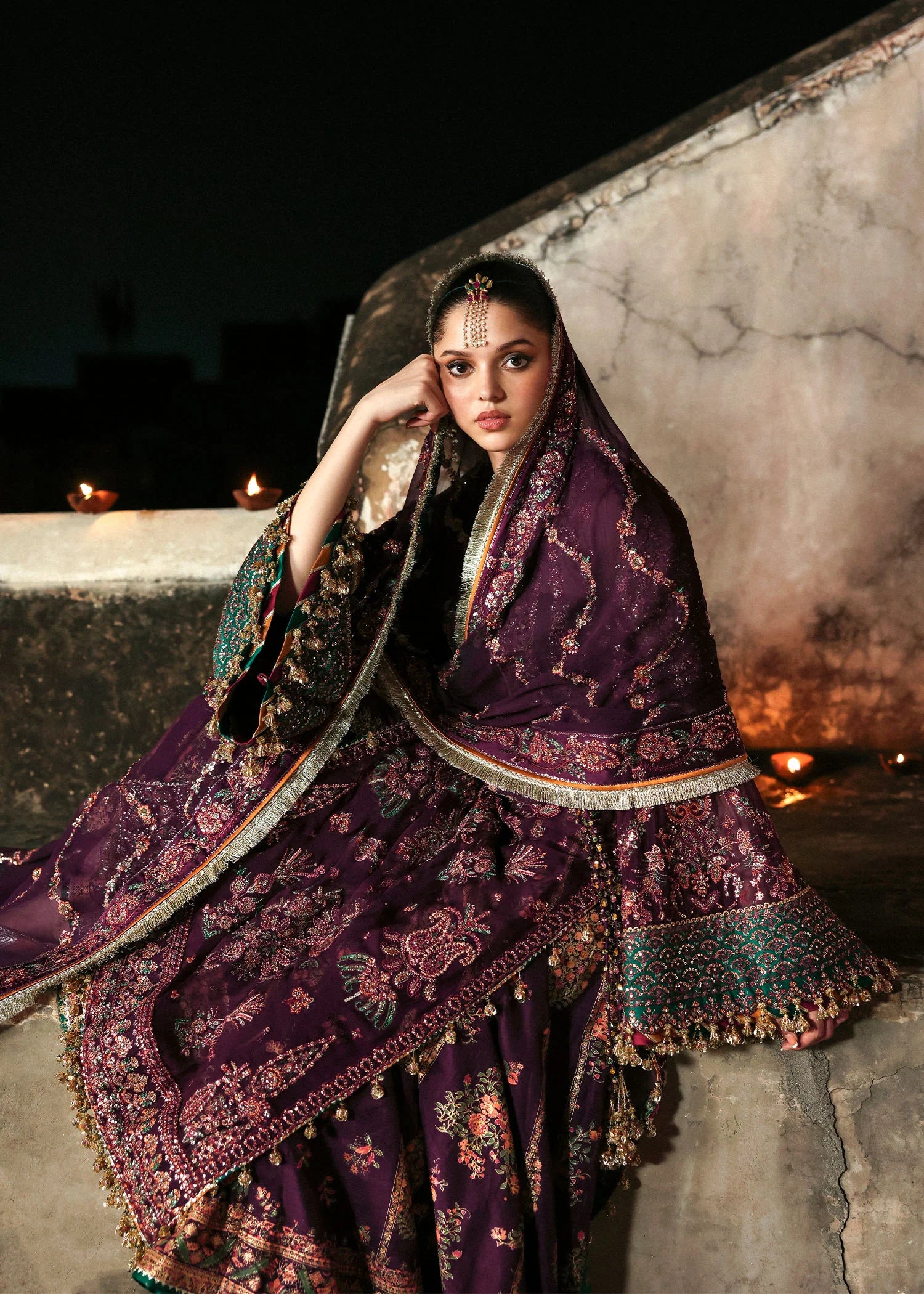 Model wearing deep plum festive outfit Ghazal by Hussain Rehar, Pakistani luxury pret perfect for weddings, available in UK