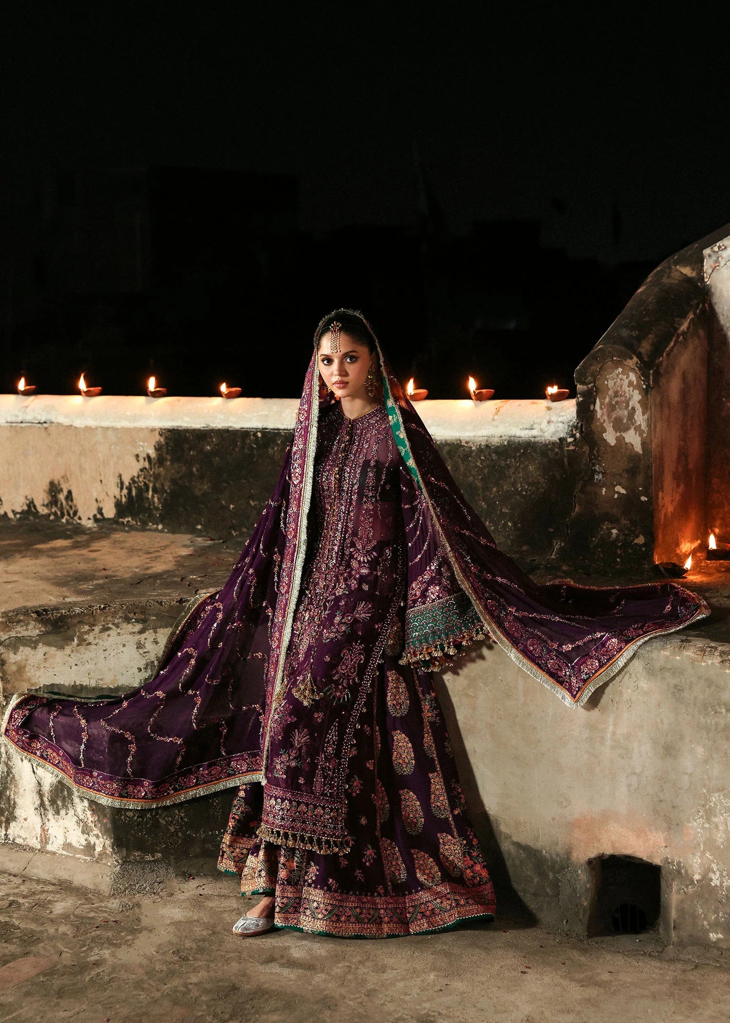 Model wearing deep plum festive outfit Ghazal by Hussain Rehar, Pakistani luxury pret perfect for weddings, available in UK