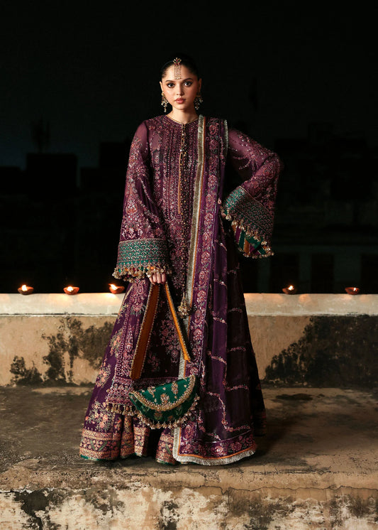 Model wearing deep plum festive outfit Ghazal by Hussain Rehar, Pakistani luxury pret perfect for weddings, available in UK