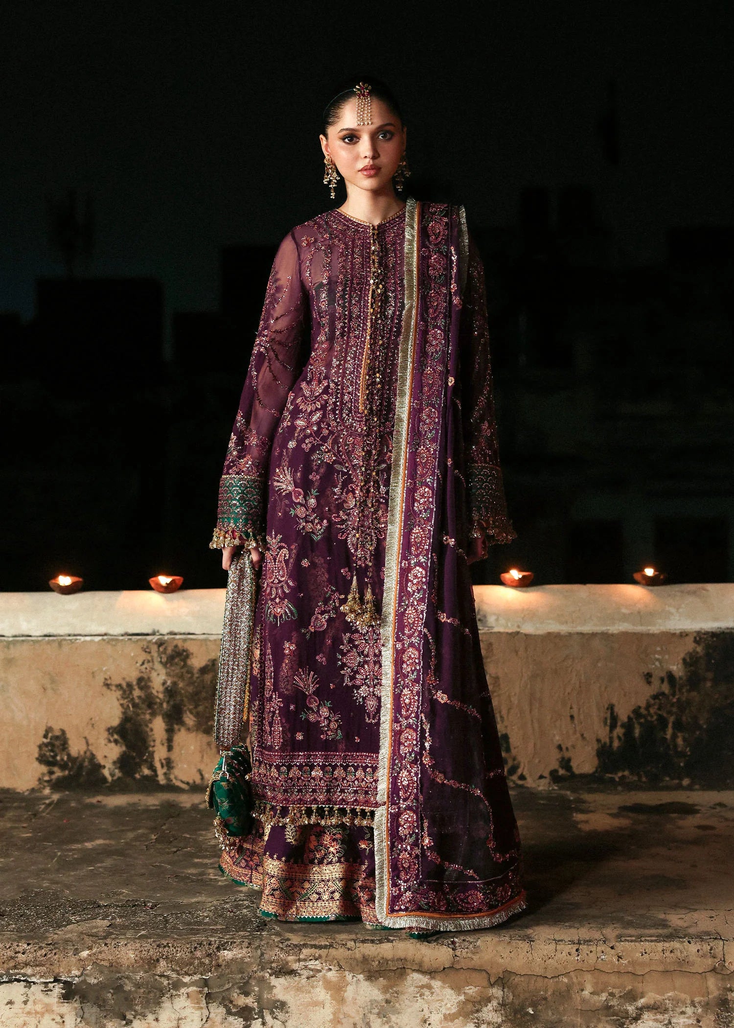 Model wearing deep plum festive outfit Ghazal by Hussain Rehar, Pakistani luxury pret perfect for weddings, available in UK