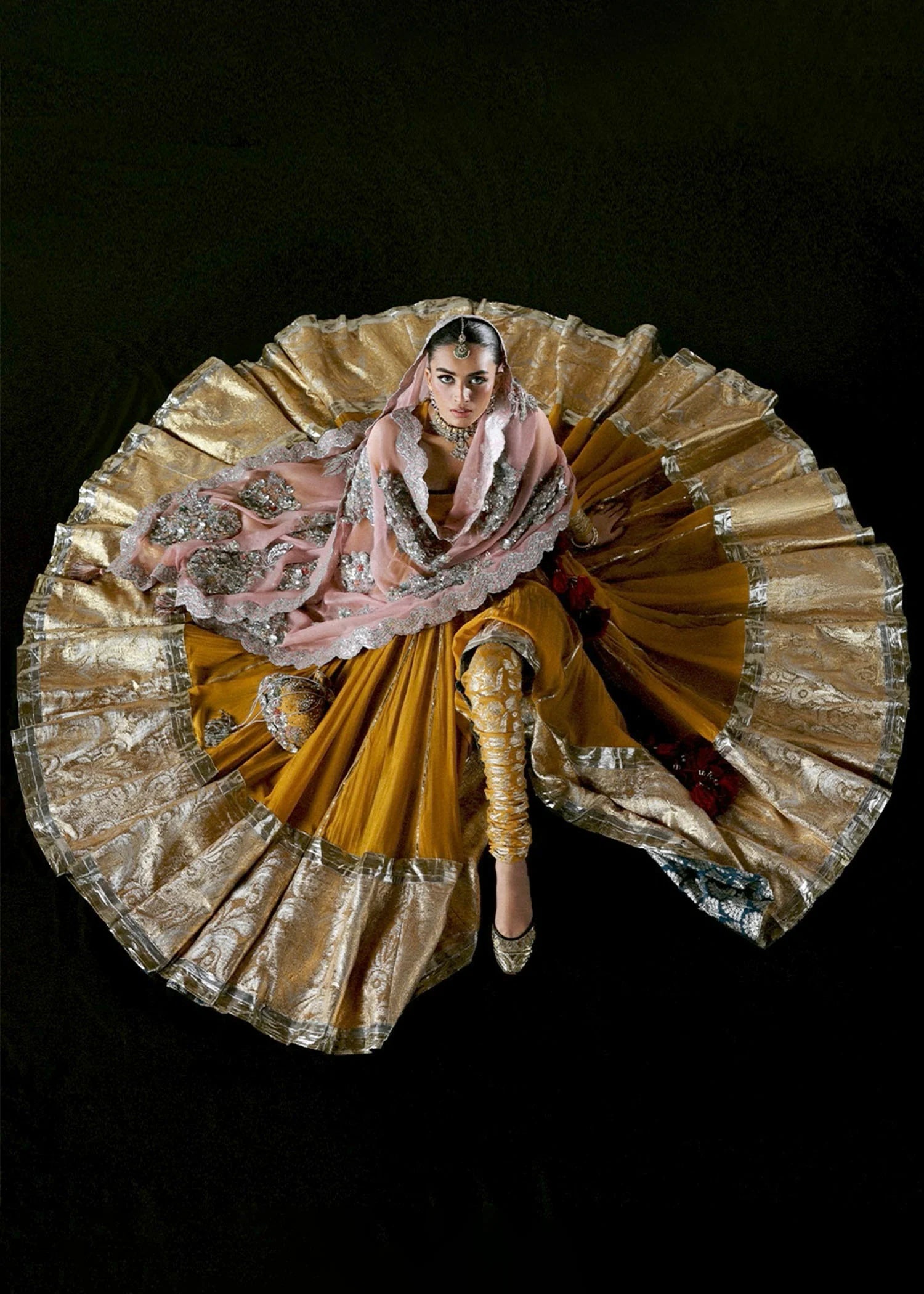 Model wearing Elika by Hussain Rehar in mustard and pink with heavy silver embellishments – exquisite Pakistani luxury pret outfit in UK.
