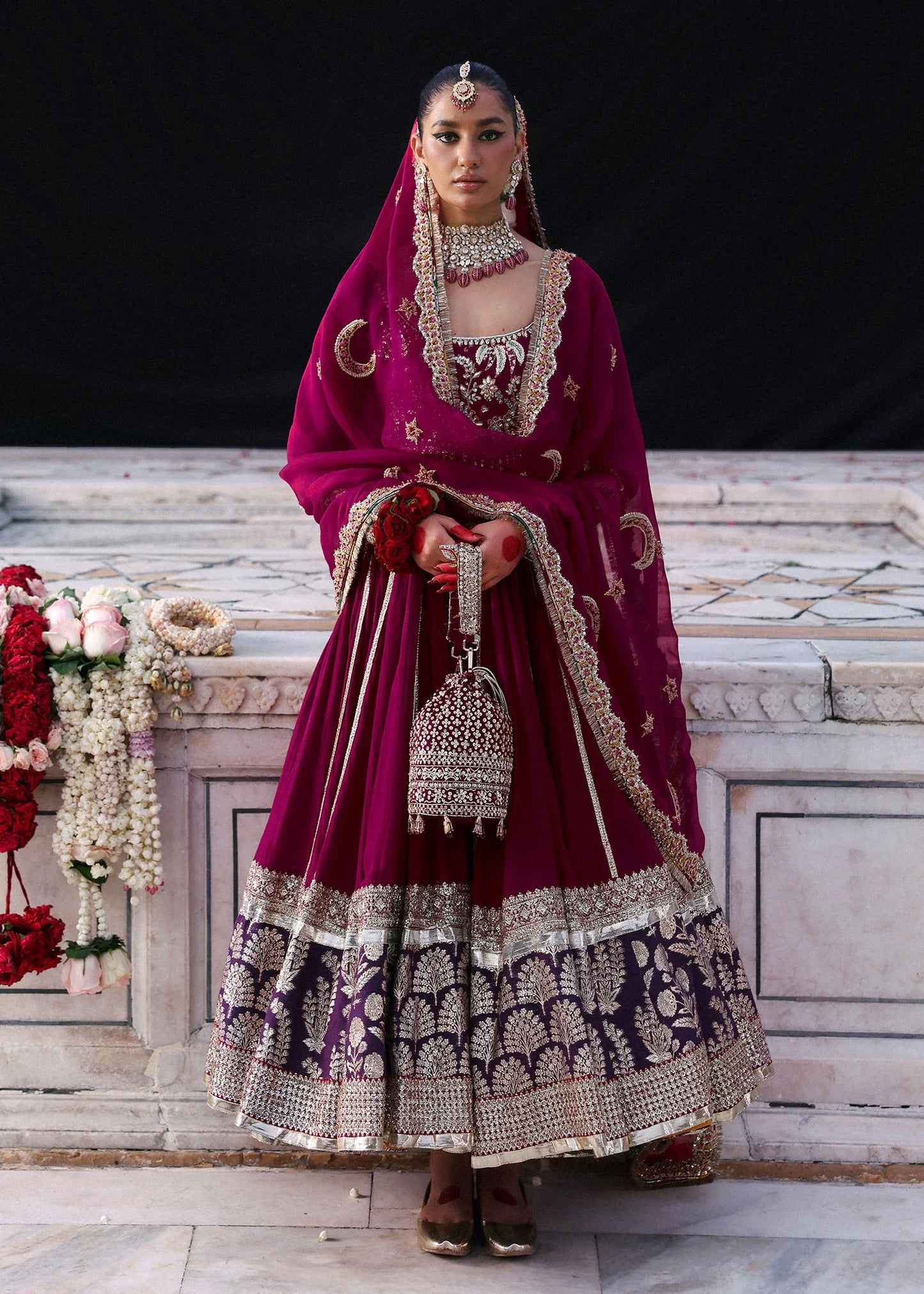 Model wearing Atash by Hussain Rehar in magenta with gold and silver embroidery – luxurious Pakistani luxury pret outfit in UK.