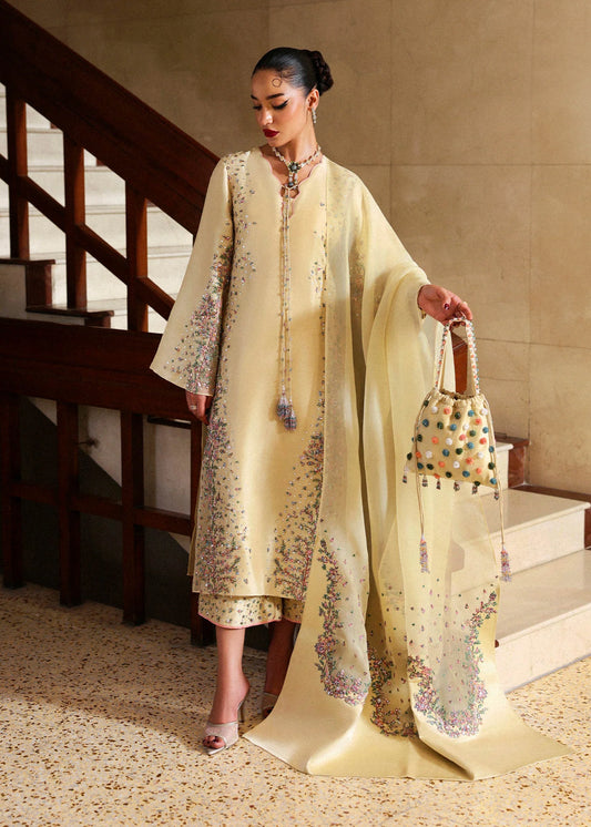 Model wearing cream Ciel dress by Hussain Rehar, Pakistani luxury pret available online in UK, ideal for festive wear