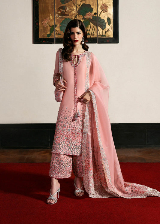 Model wearing pink Evara dress by Hussain Rehar, Pakistani luxury pret available online in UK for wedding and festive wear
