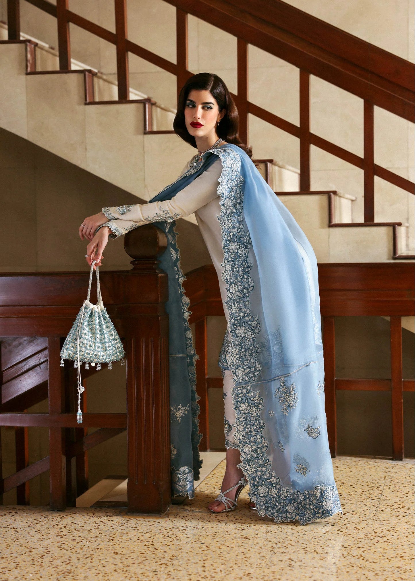Model wearing off-white and blue Virelle dress by Hussain Rehar, Pakistani luxury pret available online in UK for occasions