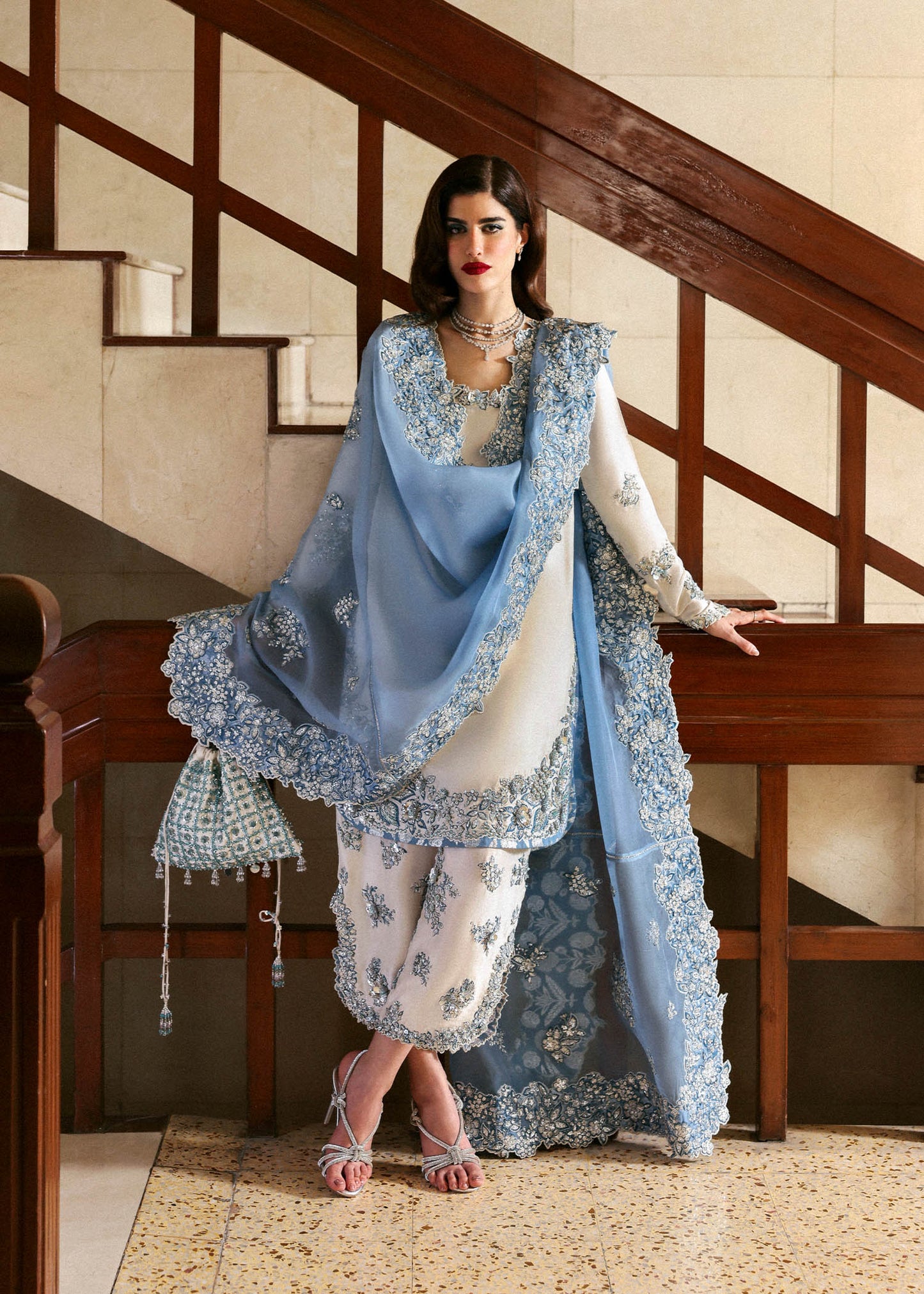 Model wearing off-white and blue Virelle dress by Hussain Rehar, Pakistani luxury pret available online in UK for occasions